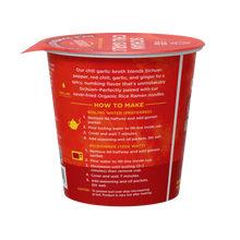 Load image into Gallery viewer, A cup of Lotus Foods Sichuan Chili Garlic Rice Ramen Noodle Soup, side of packet.
